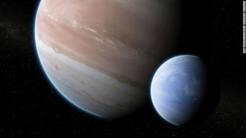 En konstnärs föreställning av gasjätten Kepler-1625b och exomånen